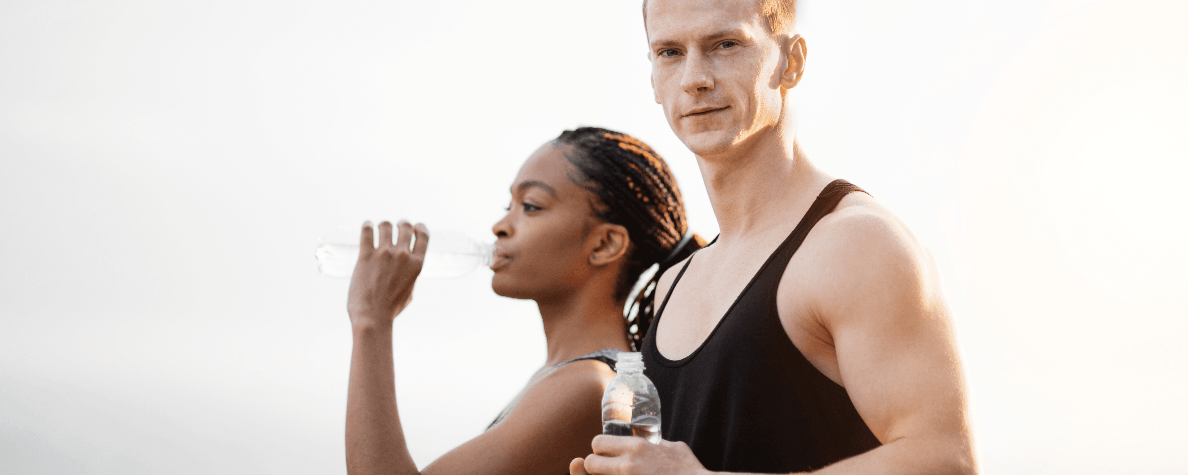Young couple drinking fresh water